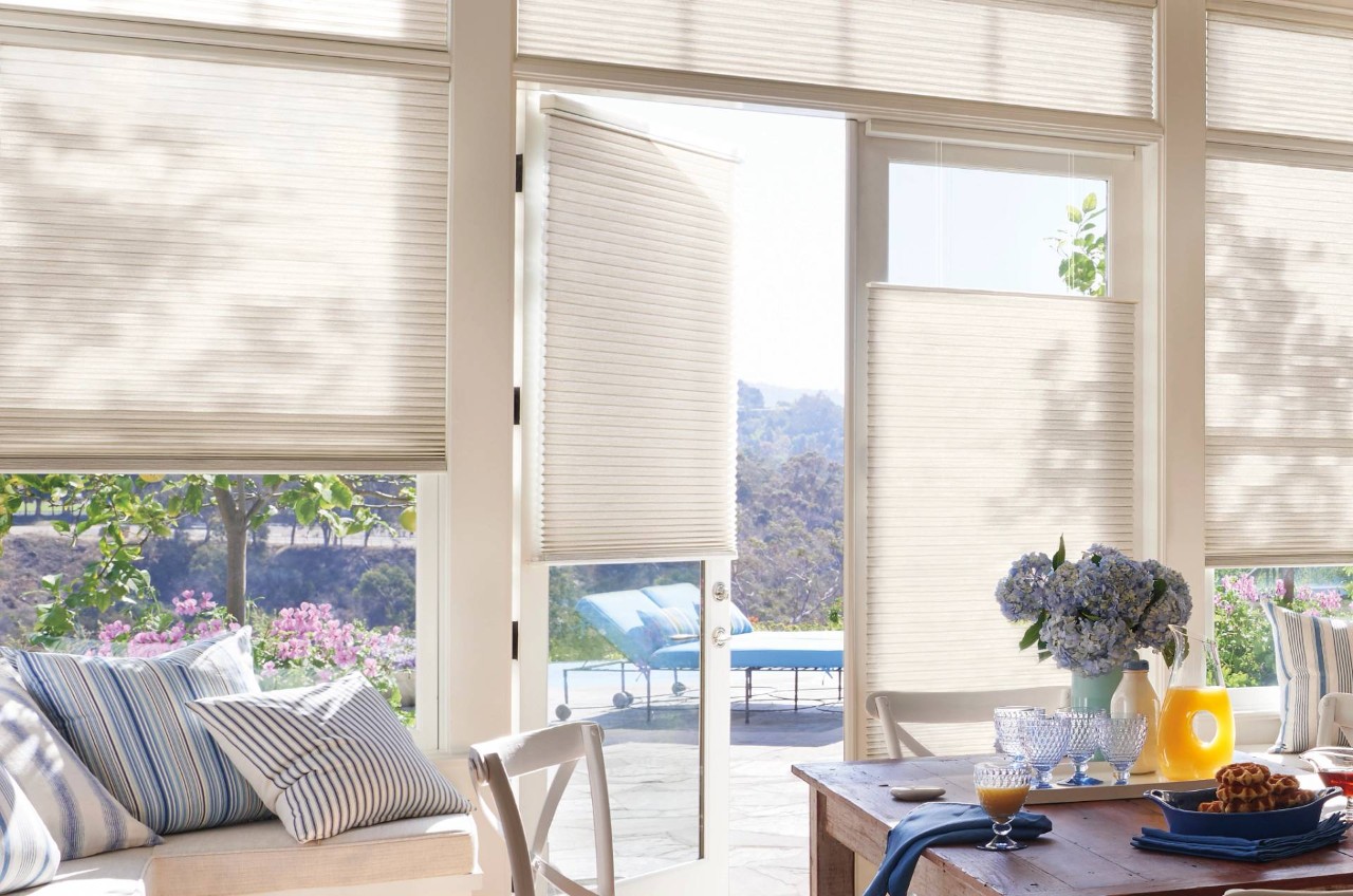  Patio door shades covering a door in a kitchen near College Station, TX